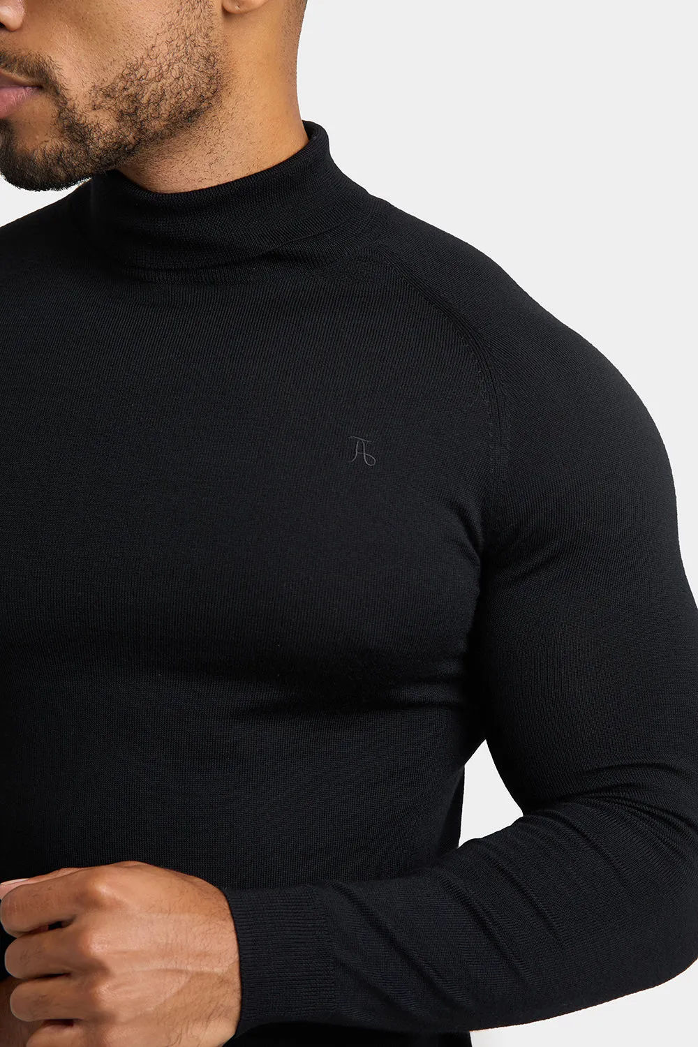 Merino Wool Roll Neck in Black